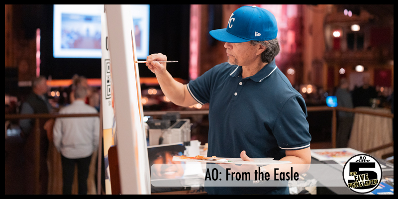 Sports Artist Anthony Ao Oropeza painting at the easle